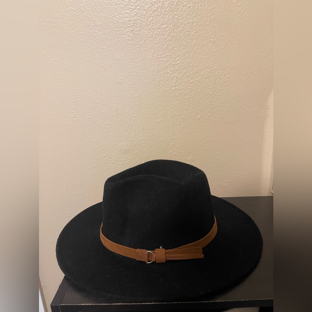 Black fedora hat. Good condition.